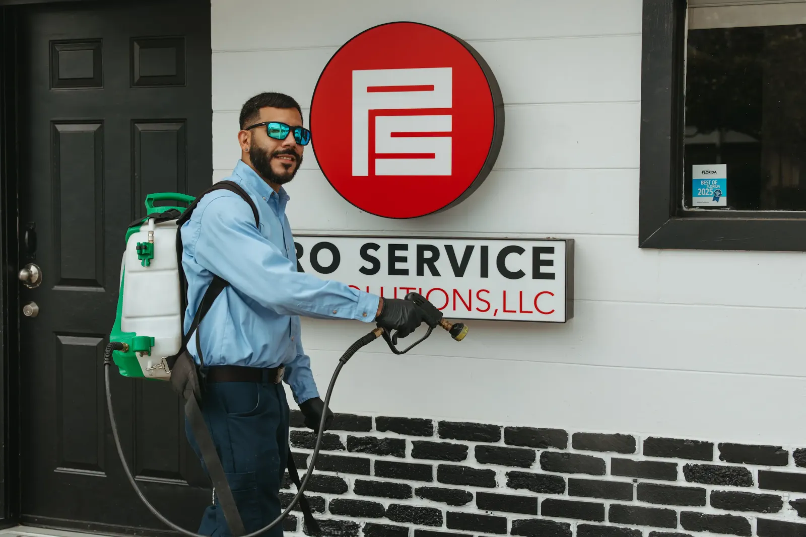 technician in front of pro service office